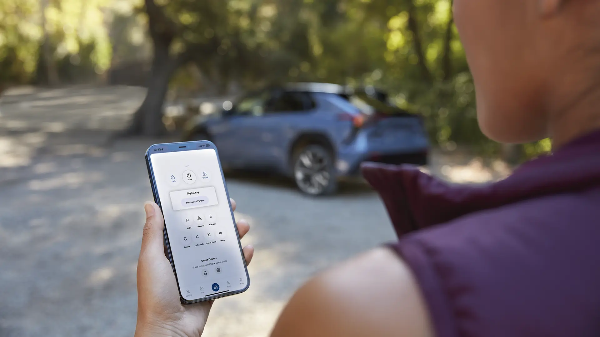 Woman unlocking Solterra with her phone