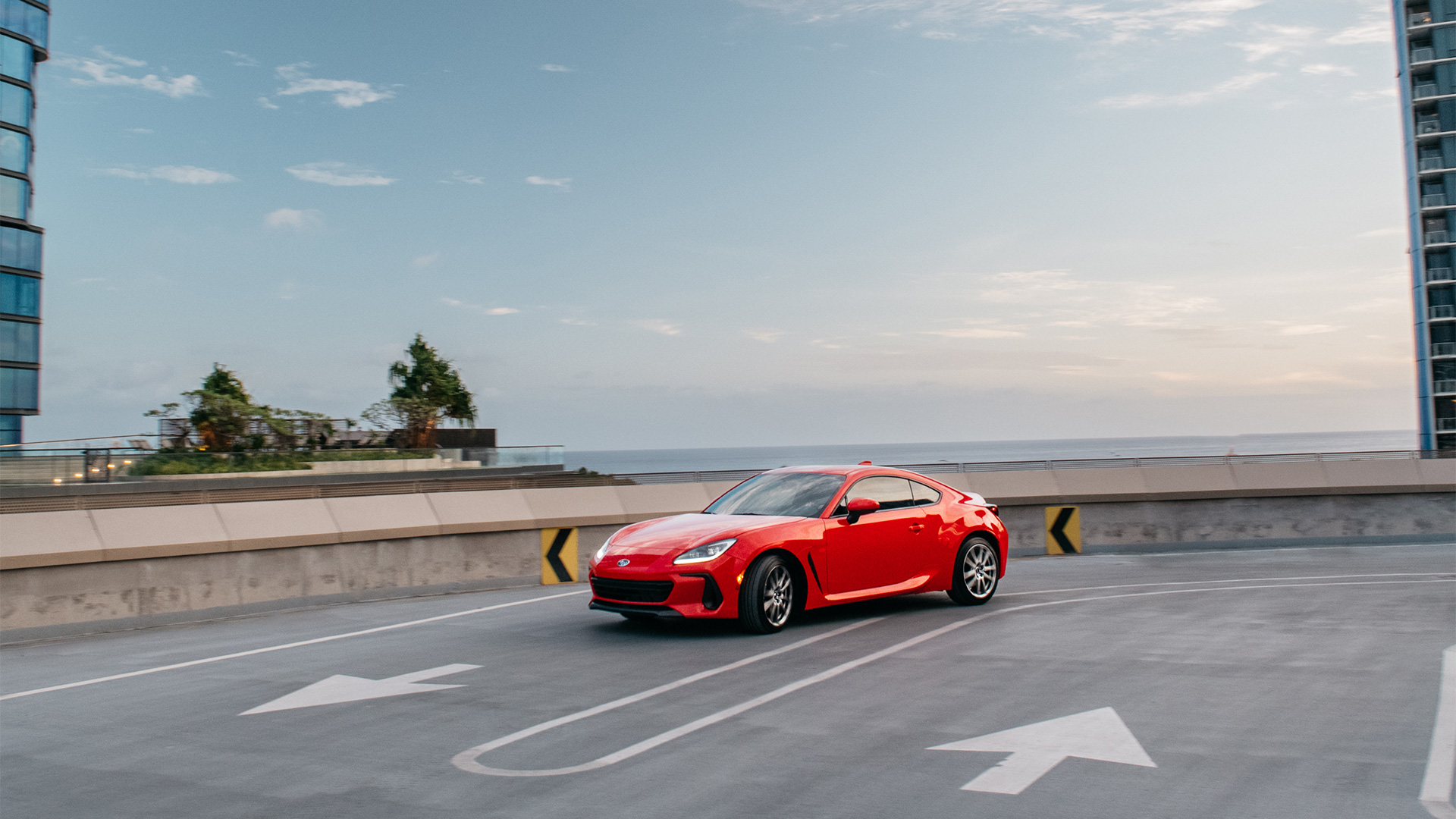 BRZ Premium shown in Ignition Red driving on scenic road